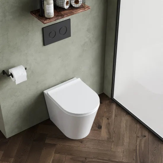 nuie Fenton Round Rimless Back to Wall Toilet Pan With Soft Close Seat